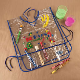 Royal & Langnickel Big Kid's Choice Apron, laid flat with brushes (not included) inserted in pockets