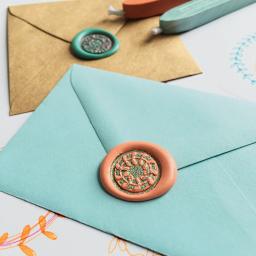 Manuscript Wax Sealing Kits -Example of wax seal on blue envelope