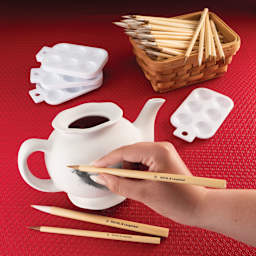 Royal & Langnickel Bamboo Brushes and Palettes Class Pack, brush in hand painting on ceramic vase