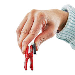 The Pencil Grip Magnet Man Magnetic Clip in hand
