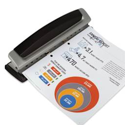 Swingline Precision Pro Desktop Punch with paper inserted