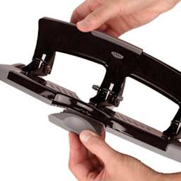Swingline SmartTouch 3-Hole Punch being held