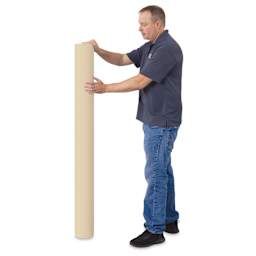 Blick Unprimed Cotton Canvas - Medium Weight, Medium-Smooth Texture, 60" x 25 yds, man standing next to roll