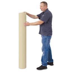 Blick Unprimed Cotton Canvas - Medium Weight, Medium-Smooth Texture, 60" x 50 yds, man standing next to roll