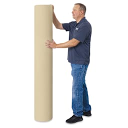 Blick Unprimed Cotton Canvas - Medium Weight, Medium-Smooth Texture, 72" x 100 yds, man standing next to roll