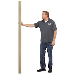 Blick Studio Unprimed Linen Canvas Rolls and Blankets - Rough, 10 oz, 84" x 6 yards, Roll next to a 6'2" person