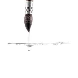 Escoda Último Evolution Brush, being pulled out of water