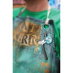 Royal Talens Tube Wringer hanging on an apron (not included)