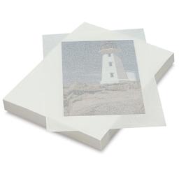 Pacon Tracing Paper - Ream of transparent paper with one sheet over lighthouse picture