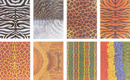 Roylco Decorative Paper Pack - 8 Animal patterns shown