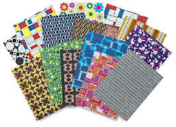 Roylco Decorative Papers - 16 Retro Pop patterns shown spread in fan