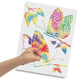 Scratch-Art Colored Papers - Child's hand scratching white paper to make rainbow butterflies