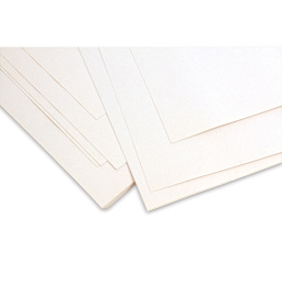 Richeson Bulk Newsprint Sheets - Closeup of corner of Sheets stacked randomly