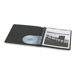 Prat Start Refillable Presentation Books - Black Presentation Book open showing art and CD 
