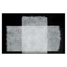 Abaca Self-Adhesive Hinging Tape - Closeup of 2 overlapping pieces of tape