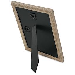 Blick Bellevue Frame - Grey Woodgrain, 8" x 10", resting on easel back