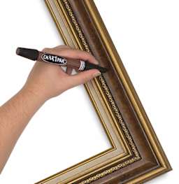 Chartpak Touch-Up Markers for Picture Frames - Artist touching up Frame
