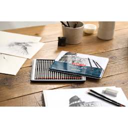 Derwent Graphic Pencils - Complete Graphite, Set of 24, on desk with sketches