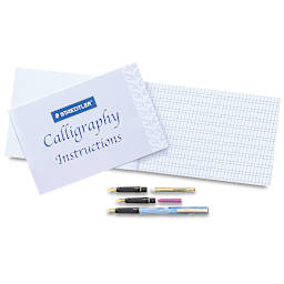 Calligraphy Pen Set - Top view of practice pad, instructions and assorted pens
