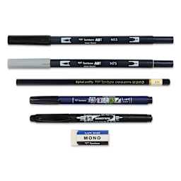 Tombow Lettering Basics Set, pens and markers with caps on, laid outside of the packaging