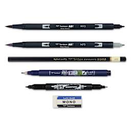 Tombow Lettering Basics Set, pens and markers with caps off, laid outside of the packaging