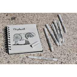 Marvy Uchida LePen Technical Drawing Pens with a drawing of an elephant filled in with detailed designs.
