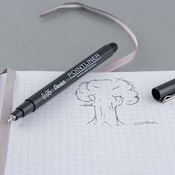 Pentel Arts Pointliner Pen - Uncapped black pen with sketch of tree on graph paper