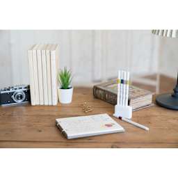 Uni Emott Fineliners - Set of 5, Retro Colors (on table with notebook)