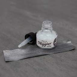 Higgins Acrylic Ink - Silver, 1 oz bottle with dropper and swatch over black paper