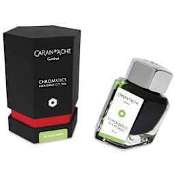 Caran d'Ache Chromatics Ink - Delicate Green, 50 ml Jar, jar next to packaging