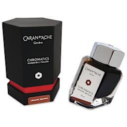 Caran d'Ache Chromatics Ink - Organic Brown, 50 ml Jar, jar next to packaging
