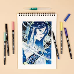 Tombow Dual Brush Manga Illustration Pens - Moon, Kit of 10, finished artwork and pen markers laid out