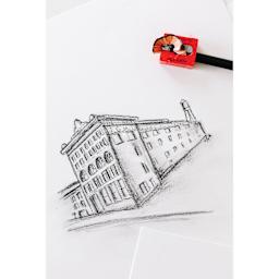 General's All Art Pencil Sharpener (sharpener sharpening a pencil on top of a drawing)