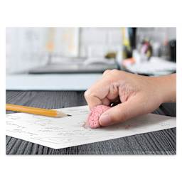 Fred Think Again Eraser (in use, eraser removing pencil marks)