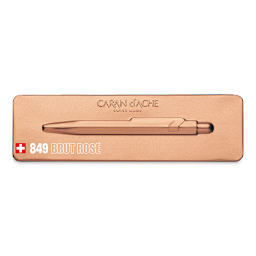 Caran d'Ache 849 Premium Ballpoint Pen - Brut Rose case
