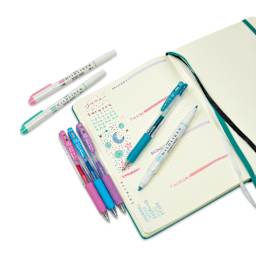 Zebra Sarasa Clip Gel Retractable Pens - Several different pens shown with Journal