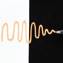 Sakura Gelly Roll Moonlight Pen - Pastel Orange, Bold Point on black and white paper comparison