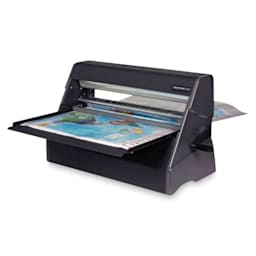 Xyron Pro XM2500 Cold Laminator loaded with a poster to laminate
