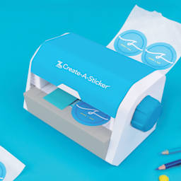 Xyron Create-A-Sticker Sticker Maker, stickers coming out of machine