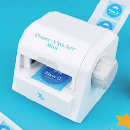 Xyron Create-a-Sticker Mini Sticker Maker, sticker coming out of machine