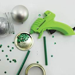 Surebonder Specialty Series Cool Shot Super Low Temp Mini Glue Gun, adhering gems to a metal lid