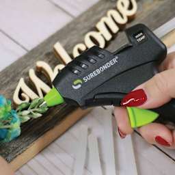 Surebonder Plus Series Mini High Temp Glue Gun, in hand