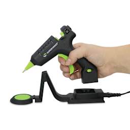 Surebonder Specialty Series Mini Cordless High Temp Glue Gun, hand lifting glue gun from the base