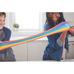 Elmer's Rainbow Glitter Glue Pens Set, youth stretching a colorful slime project made with glue pens