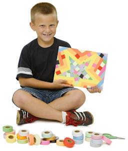 Col-R-Tone System Masking Tape - Child holding Star artwork made with strips of tape