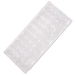 StikkiWorks StikkiDots Adhesive Wax Dots, angled view of Dots on sheet