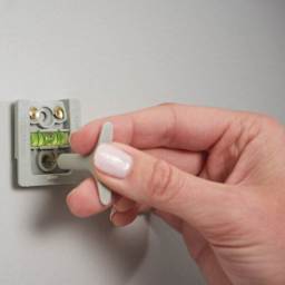 Duck EasyMounts Interior Drywall Picture Hanger - Pkg of 2, demonstrating how to center the hanger.