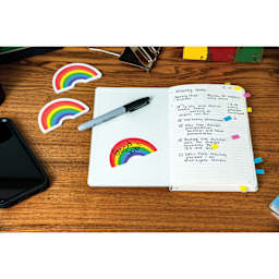 Post-it Rainbow Notes - written on and placed on page of notebook