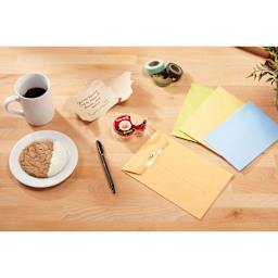 Scotch Super Hold Tape adhering manila envelopes closed