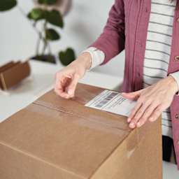 Duck HD Clear Heavy Duty Packing Tape - 1.88" x 54.6 yds - in use to seal cardboard box